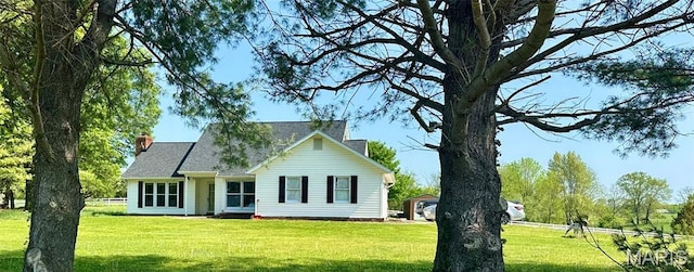 256 Black Oak Trl, Jackson, MO 63755 - rear view of house with a lawn and a chimney