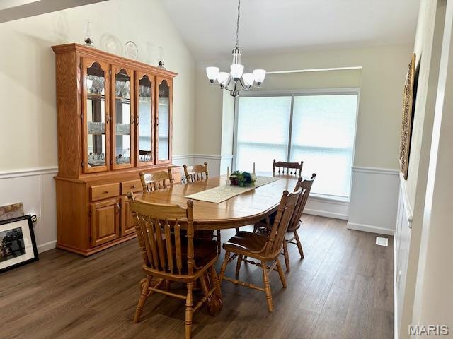 256 Black Oak Trl, Jackson, MO 63755 - dining space with a chandelier, dark wood-style flooring, and vaulted ceiling
