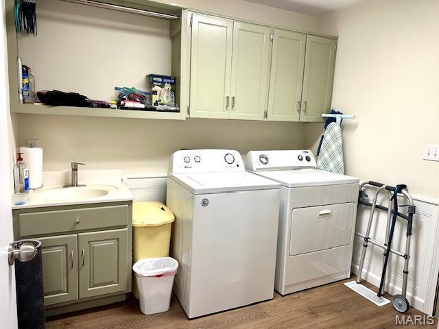 256 Black Oak Trl, Jackson, MO 63755 - washroom with cabinet space, separate washer and dryer, and wood finished floors