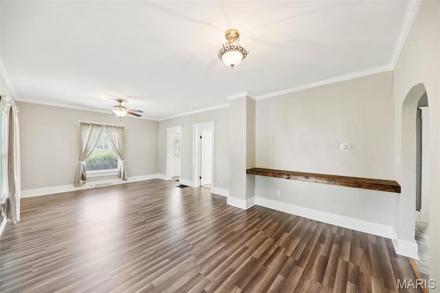 410 W Easton St, Gillespie, IL 62033 - unfurnished living room featuring arched walkways, wood finished floors, ceiling fan, and crown molding