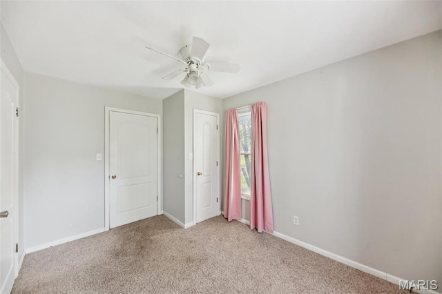 410 W Easton St, Gillespie, IL 62033 - unfurnished bedroom featuring carpet flooring and ceiling fan