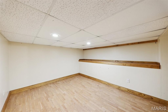 410 W Easton St, Gillespie, IL 62033 - finished basement featuring wood finished floors, a paneled ceiling, and recessed lighting