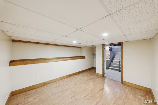 410 W Easton St, Gillespie, IL 62033 - finished basement featuring a drop ceiling, stairway, wood finished floors, and recessed lighting