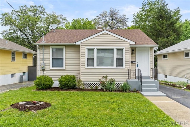 209 Monica Dr, Saint Louis, MO 63127 - view of front of home featuring a front yard and roof with shingles