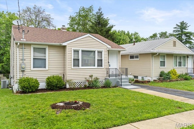 209 Monica Dr, Saint Louis, MO 63127 - ranch-style home featuring a front yard, a shingled roof, and a chimney