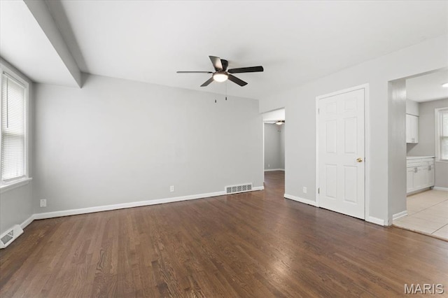 209 Monica Dr, Saint Louis, MO 63127 - unfurnished living room featuring ceiling fan and wood finished floors