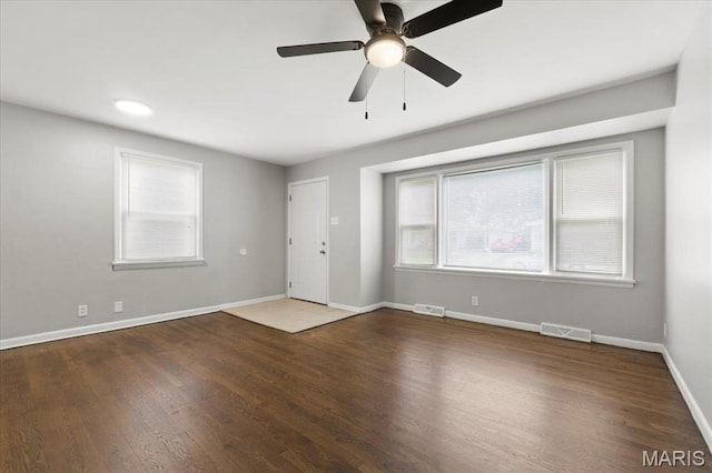209 Monica Dr, Saint Louis, MO 63127 - spare room featuring wood finished floors and a ceiling fan