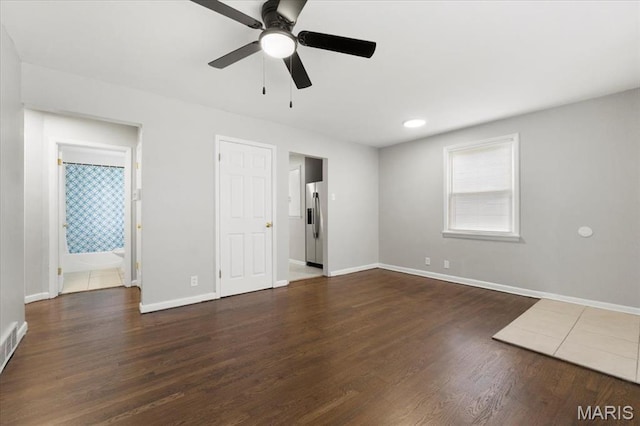 209 Monica Dr, Saint Louis, MO 63127 - unfurnished living room with wood finished floors and a ceiling fan