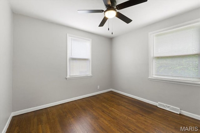 209 Monica Dr, Saint Louis, MO 63127 - empty room featuring dark wood finished floors and ceiling fan
