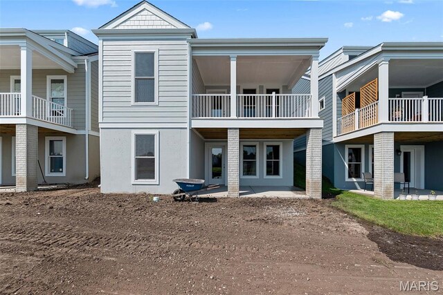 114 Marais Temps Clair, Saint Charles, MO 63301 - rear view of property with a patio area and stucco siding