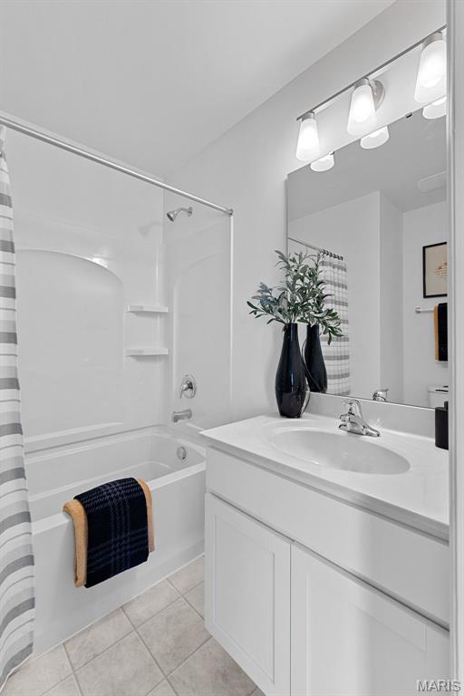 114 Marais Temps Clair, Saint Charles, MO 63301 - full bath featuring vanity, tile patterned flooring, and shower / bath combination with curtain