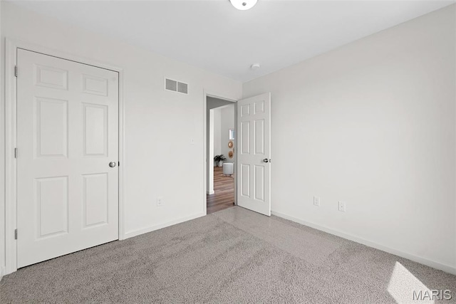 114 Marais Temps Clair, Saint Charles, MO 63301 - unfurnished bedroom featuring baseboards and carpet floors