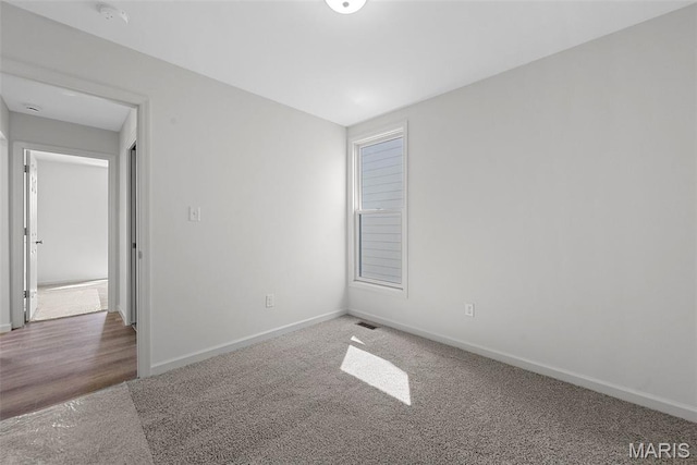 114 Marais Temps Clair, Saint Charles, MO 63301 - empty room with carpet flooring and a smoke detector