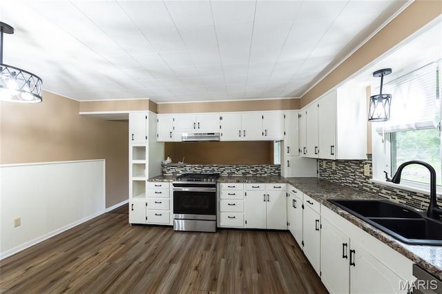 21 Mcfarland Dr, Rolla, MO 65401 - kitchen with stainless steel range with gas cooktop, under cabinet range hood, dark wood-style flooring, white cabinetry, and tasteful backsplash