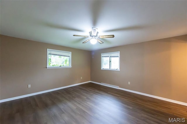 21 Mcfarland Dr, Rolla, MO 65401 - unfurnished room featuring ceiling fan and dark wood finished floors