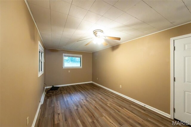 21 Mcfarland Dr, Rolla, MO 65401 - unfurnished room with crown molding, a ceiling fan, and wood finished floors