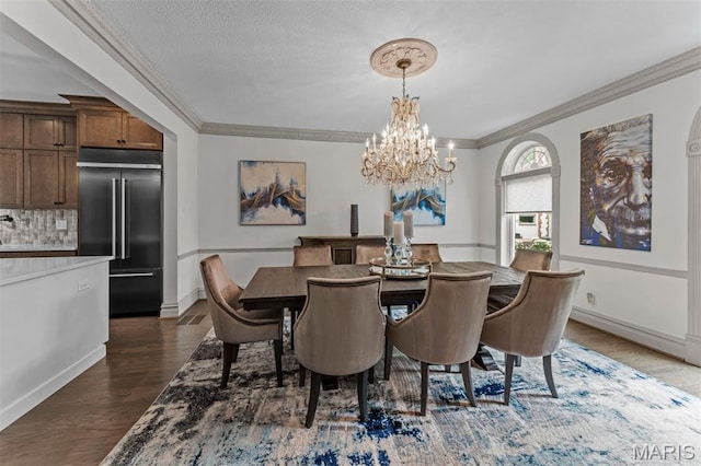 1259 Hampton Park Dr, Richmond Heights, MO 63117 - dining area featuring a chandelier, crown molding, and dark wood-style flooring