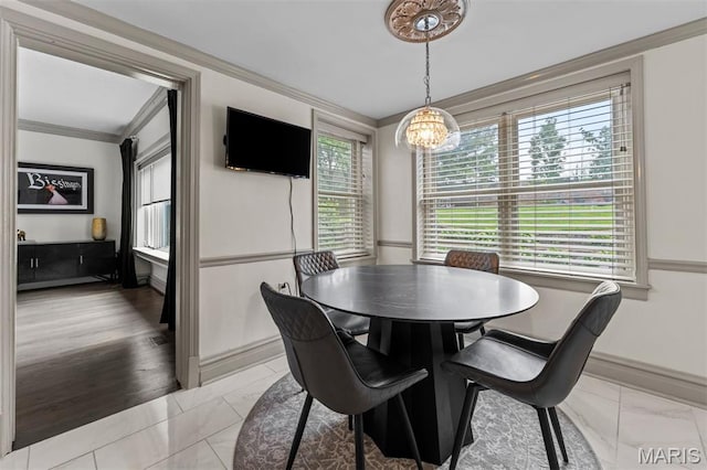 1259 Hampton Park Dr, Richmond Heights, MO 63117 - dining space with crown molding and a chandelier