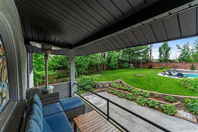 1259 Hampton Park Dr, Richmond Heights, MO 63117 - fenced backyard with a patio and an outdoor living space