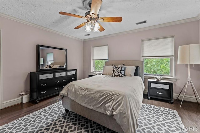 1259 Hampton Park Dr, Richmond Heights, MO 63117 - bedroom featuring wood finished floors, multiple windows, a textured ceiling, ornamental molding, and ceiling fan