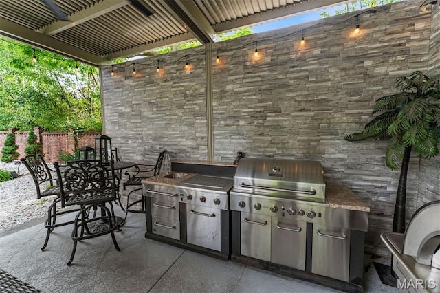 1259 Hampton Park Dr, Richmond Heights, MO 63117 - view of patio featuring an outdoor kitchen