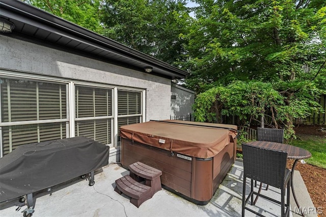 1259 Hampton Park Dr, Richmond Heights, MO 63117 - view of patio / terrace featuring a hot tub and area for grilling