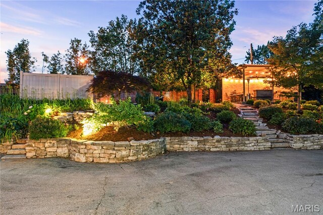 1259 Hampton Park Dr, Richmond Heights, MO 63117 - patio terrace at dusk featuring a patio