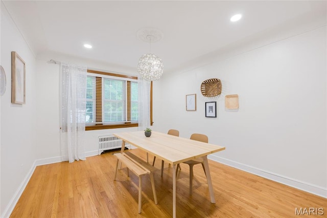 8100 Delmar Blvd Unit 1W, University City, MO 63130 - dining area with radiator heating unit, a chandelier, light wood-style floors, and recessed lighting