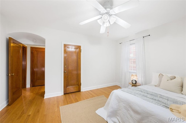 8100 Delmar Blvd Unit 1W, University City, MO 63130 - bedroom featuring light wood-style flooring and a ceiling fan
