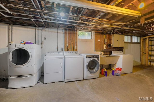8100 Delmar Blvd Unit 1W, University City, MO 63130 - washroom featuring washing machine and dryer