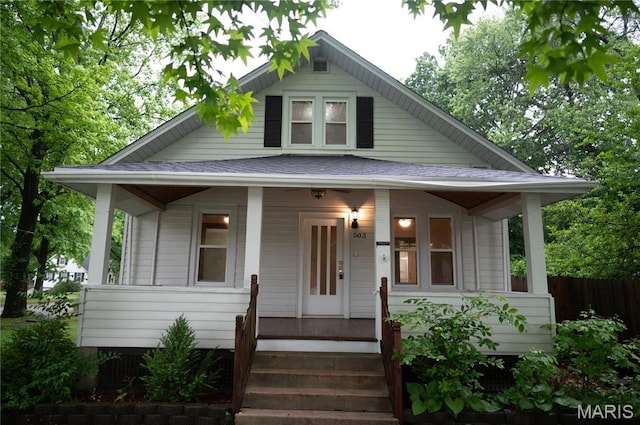 503 N Meramec St, St James, MO 65559 - bungalow-style home with covered porch and roof with shingles