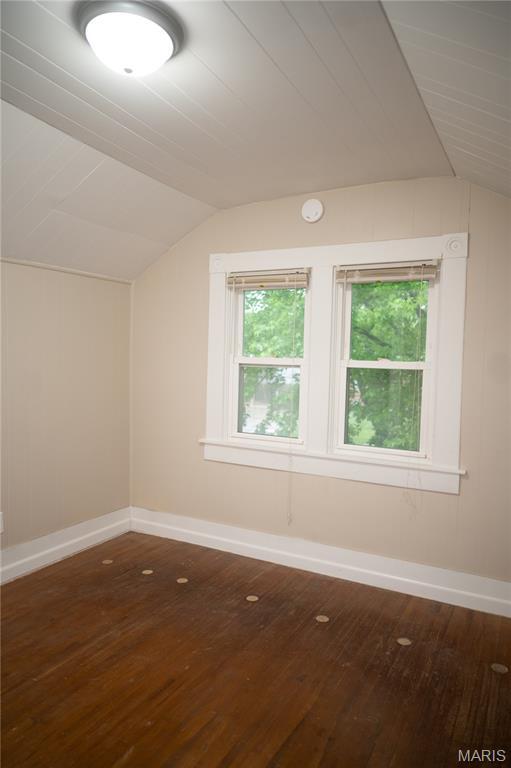 503 N Meramec St, St James, MO 65559 - bonus room with vaulted ceiling and dark wood-style flooring