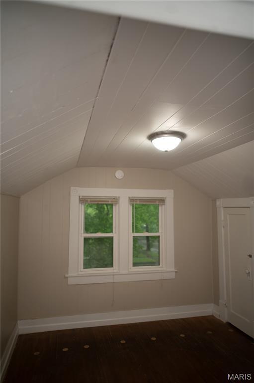 503 N Meramec St, St James, MO 65559 - additional living space featuring vaulted ceiling and dark wood finished floors