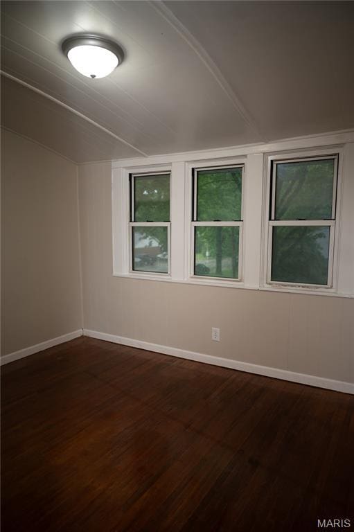 503 N Meramec St, St James, MO 65559 - spare room with baseboards and dark wood-style flooring