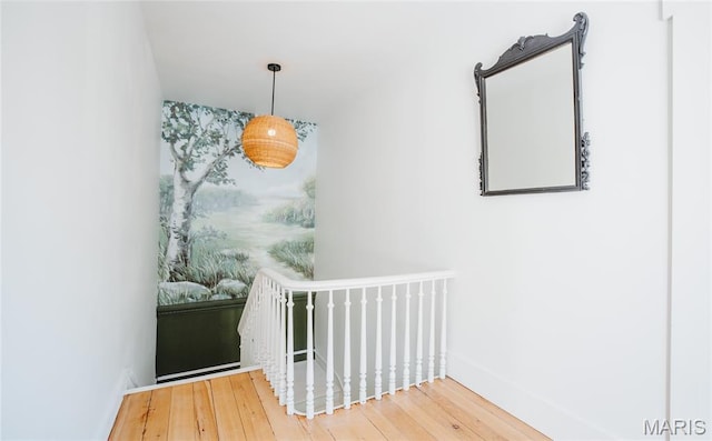 725 W Springfield St, St James, MO 65559 - stairs featuring baseboards and wood finished floors