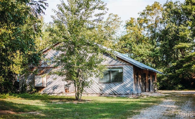 725 W Springfield St, St James, MO 65559 - view of property exterior featuring a yard