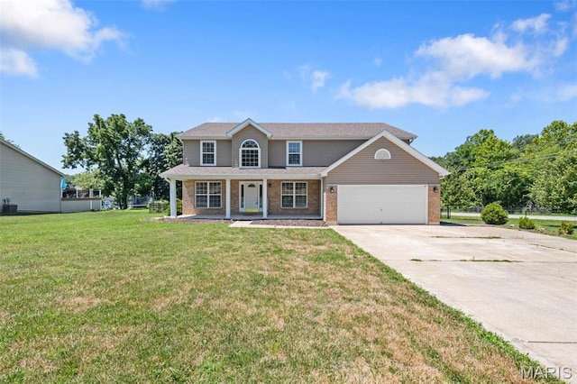 11264 Village Dr, Foristell, MO 63348 - view of front of home with a porch, concrete driveway, an attached garage, brick siding, and a front yard