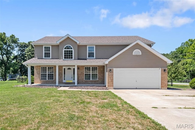 11264 Village Dr, Foristell, MO 63348 - view of front facade with concrete driveway, a garage, a front lawn, covered porch, and brick siding