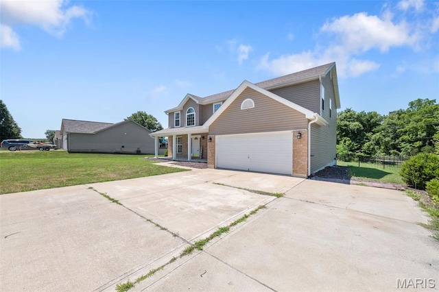 11264 Village Dr, Foristell, MO 63348 - traditional-style house with driveway, covered porch, an attached garage, and brick siding
