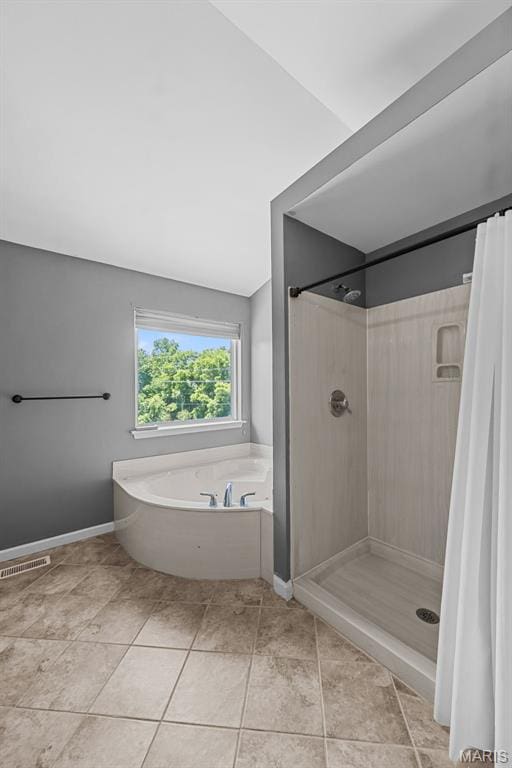 11264 Village Dr, Foristell, MO 63348 - full bath featuring a bath, curtained shower, and tile patterned flooring