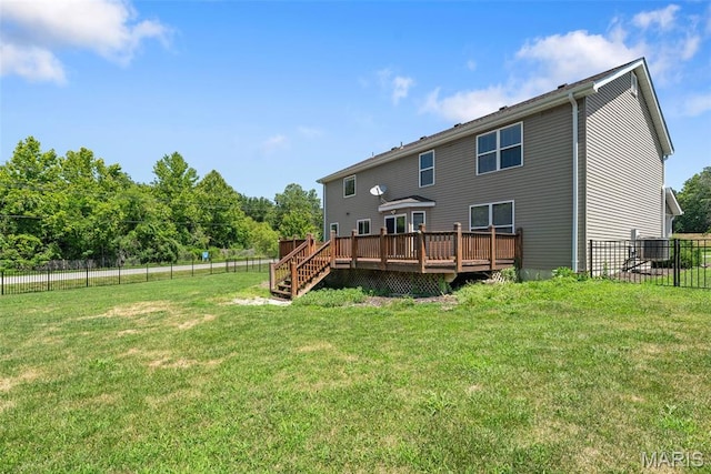 11264 Village Dr, Foristell, MO 63348 - back of property with a wooden deck and a fenced backyard