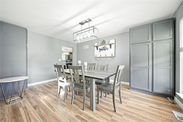 11264 Village Dr, Foristell, MO 63348 - dining area with light wood-type flooring and baseboards