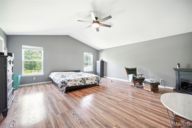 11264 Village Dr, Foristell, MO 63348 - bedroom featuring lofted ceiling, wood finished floors, and a ceiling fan