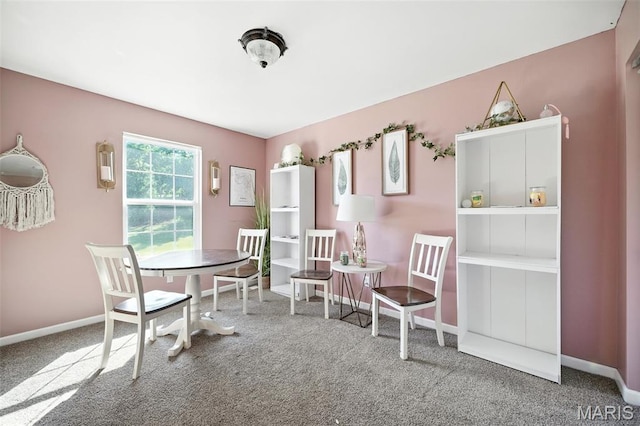 11264 Village Dr, Foristell, MO 63348 - carpeted dining space with baseboards