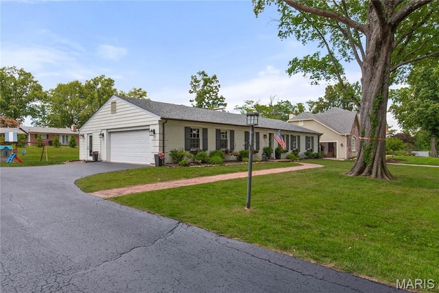 1715 Pine Hill Dr, Des Peres, MO 63131 - ranch-style home with an attached garage, asphalt driveway, a front lawn, and brick siding