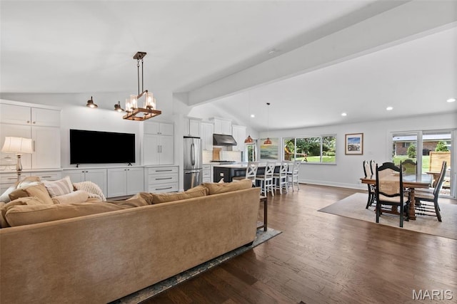 1715 Pine Hill Dr, Des Peres, MO 63131 - living area featuring dark wood-style floors, recessed lighting, and a chandelier