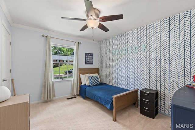 1715 Pine Hill Dr, Des Peres, MO 63131 - bedroom with wallpapered walls, light carpet, an accent wall, crown molding, and ceiling fan