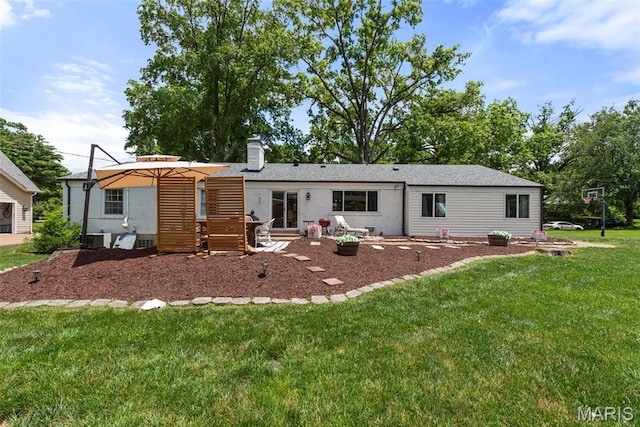 1715 Pine Hill Dr, Des Peres, MO 63131 - back of house featuring a lawn and a chimney