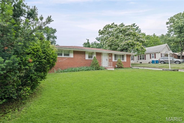 3120 Hawthorne Blvd, Alton, IL 62002 - ranch-style home with a front yard and brick siding