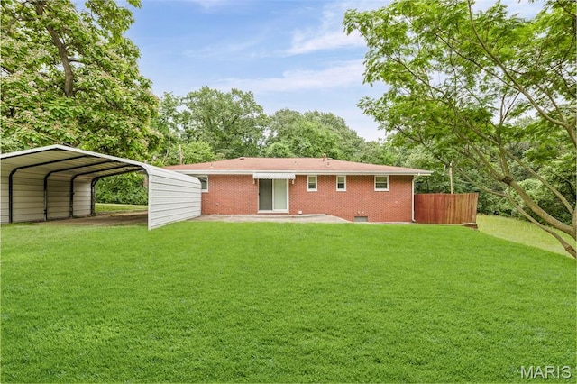 3120 Hawthorne Blvd, Alton, IL 62002 - rear view of property with a detached carport and brick siding
